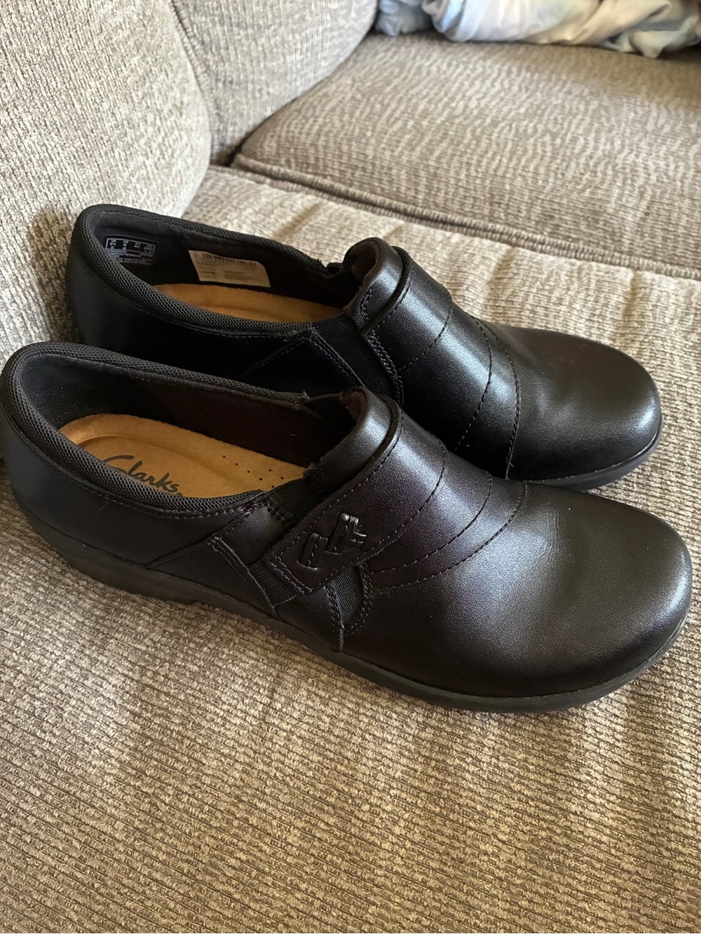 Clarks Women’s Black Slip-On Leather Shoes